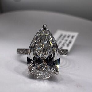 3.00 carat e vs1 pear diamond engagement ring pavé band